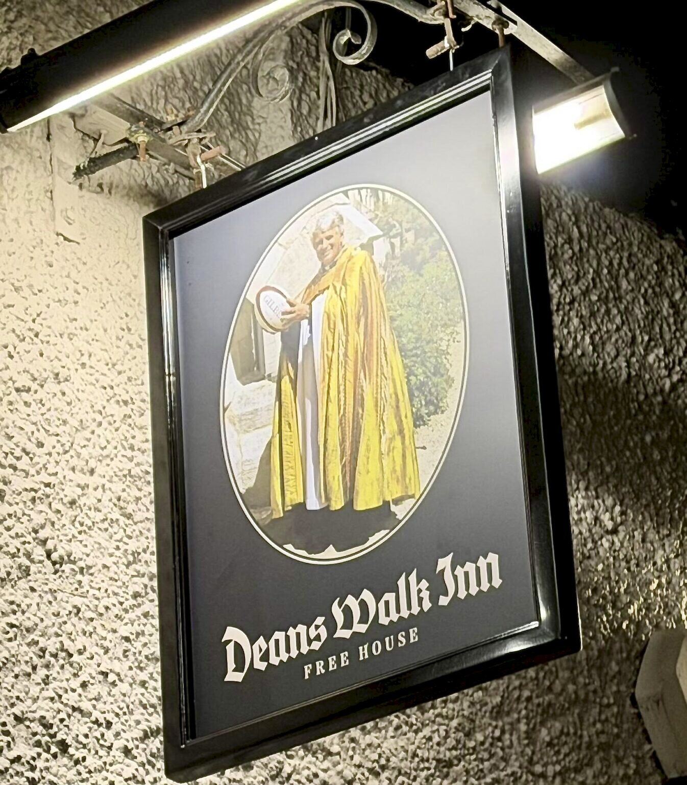 Framed Deans Walk Inn Free House sign inside the pub